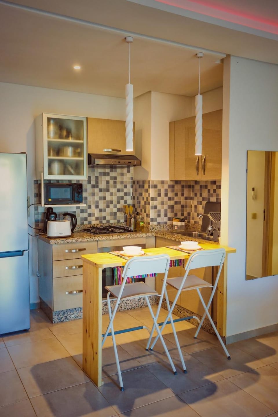Kitchen or kitchenette, oven, stove
