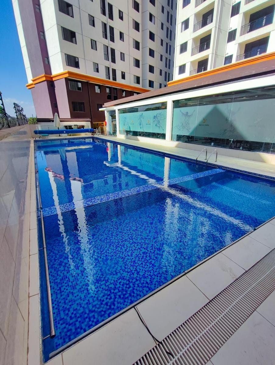 luxurious one bedroom apartment with well equipped gym,heated swimming pool, ample parking space and a relaxing rooftop with amazing city views Apartment in Nairobi