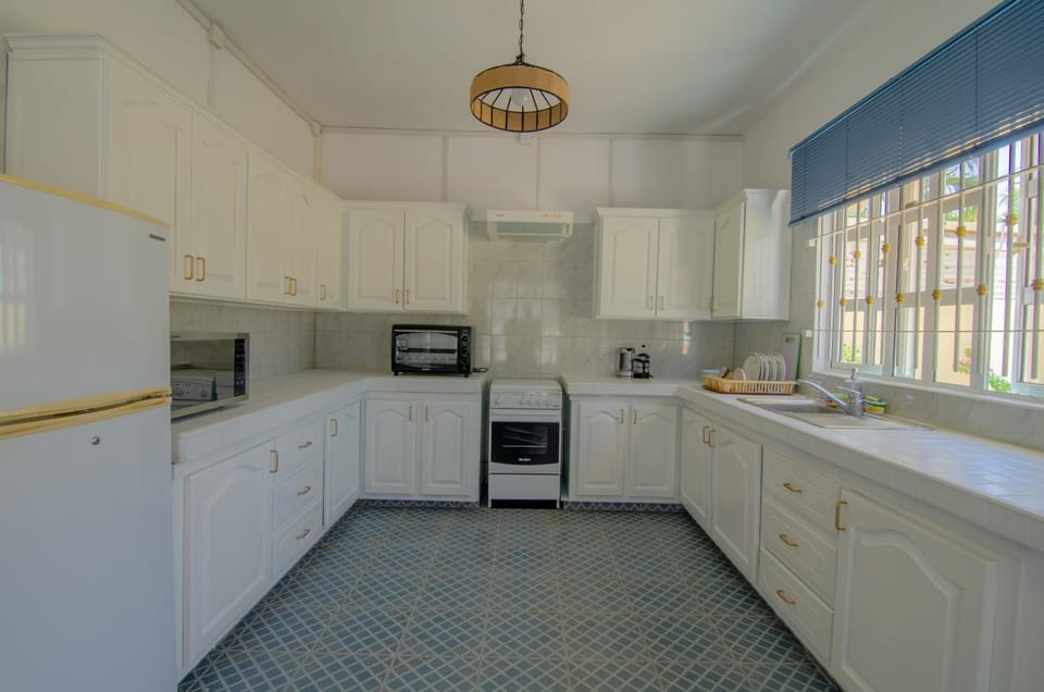 Kitchen or kitchenette, oven, stove, toaster