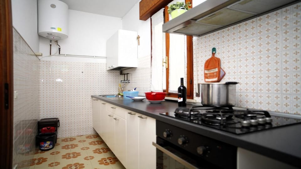 Kitchen or kitchenette, stove