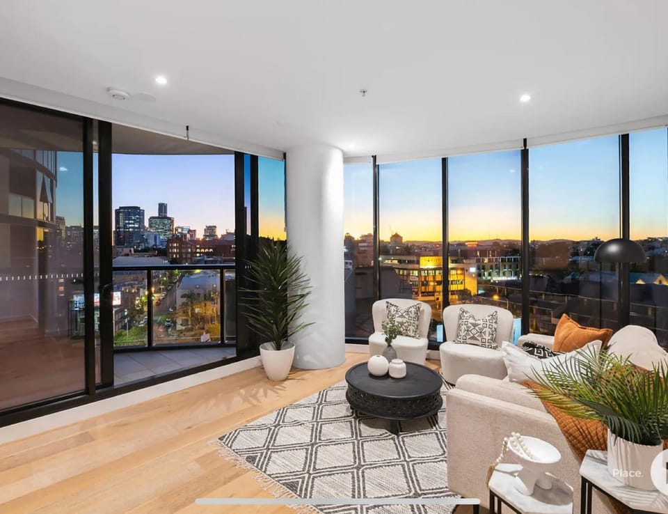 View (from property/room), Balcony/Terrace, Living room, Seating area, City view, Sunset
