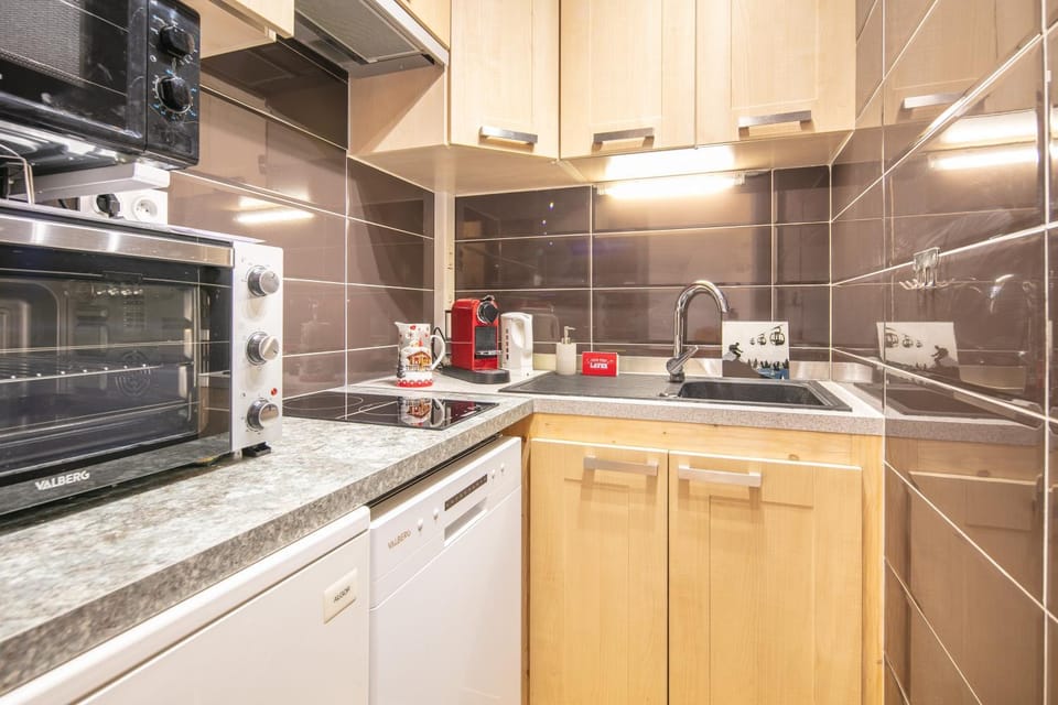 Kitchen or kitchenette, stove