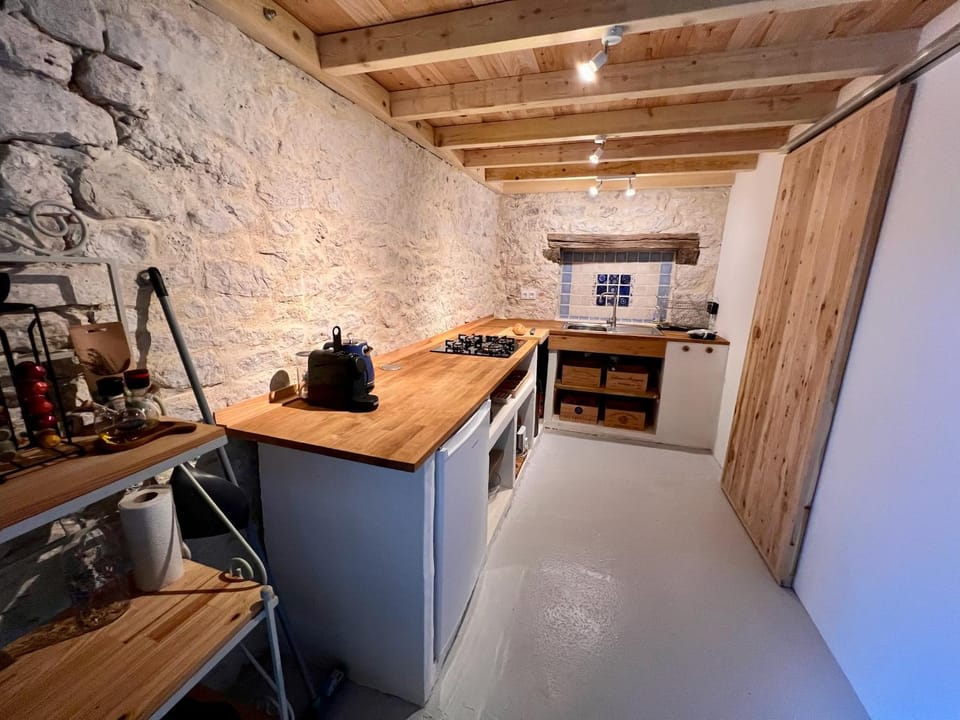 Kitchen or kitchenette, stove