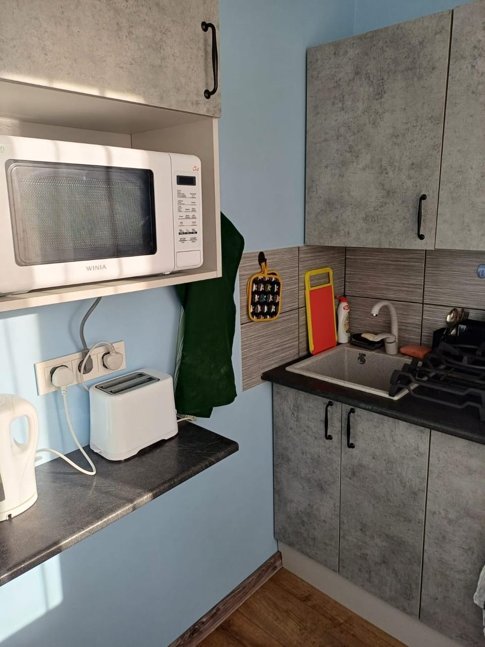 Kitchen or kitchenette, toaster