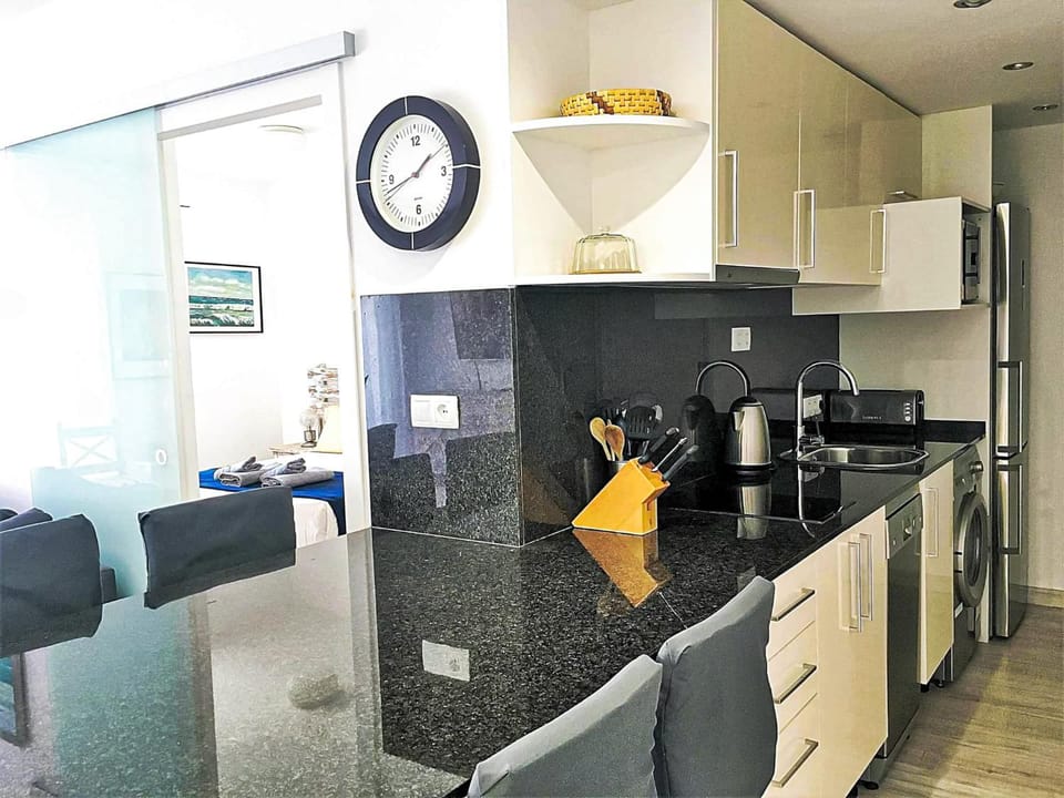 Kitchen or kitchenette, Dining area, dishwasher, oven, stove, toaster