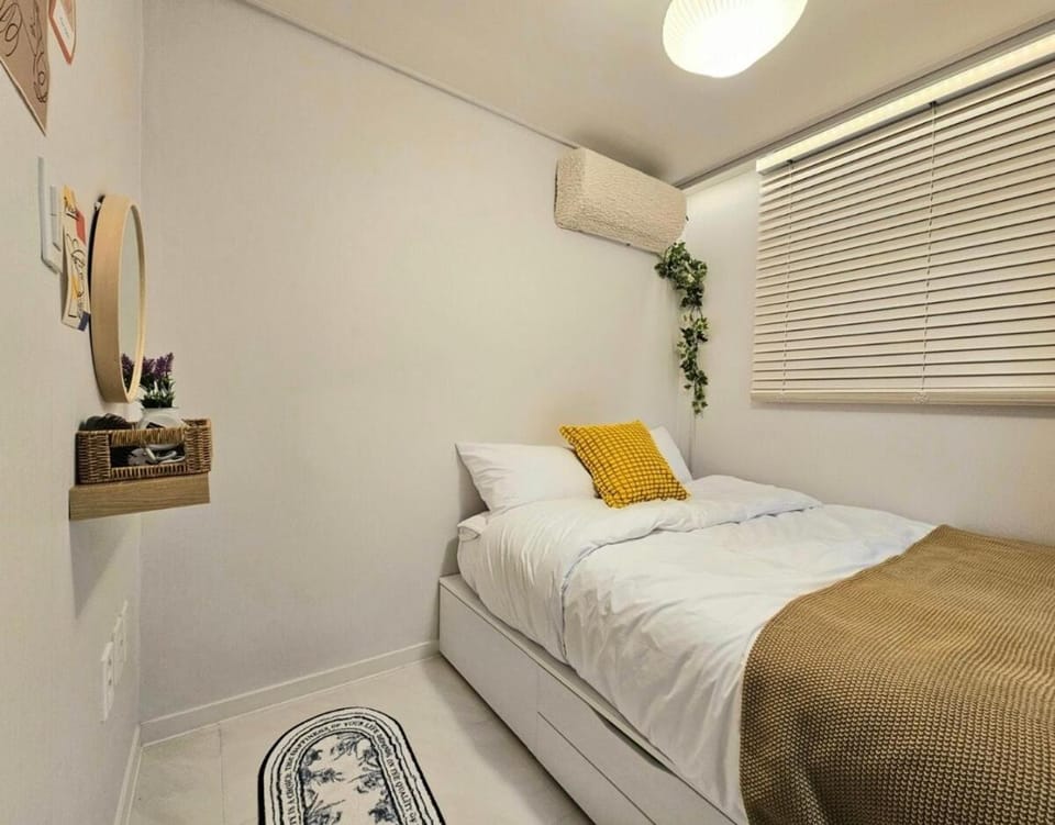 Bed, Bedroom, hair dryier, air conditioner