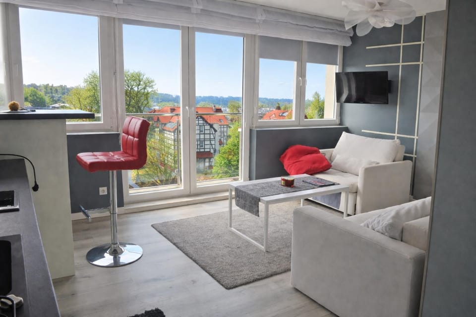 Communal lounge/ TV room, TV and multimedia, View (from property/room), Living room, Seating area, Guests, City view, Landmark view, River view, Sea view, Street view, Street view, Family