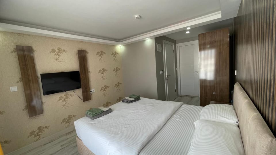 Bed, Bedroom, towels, wardrobe, air conditioner