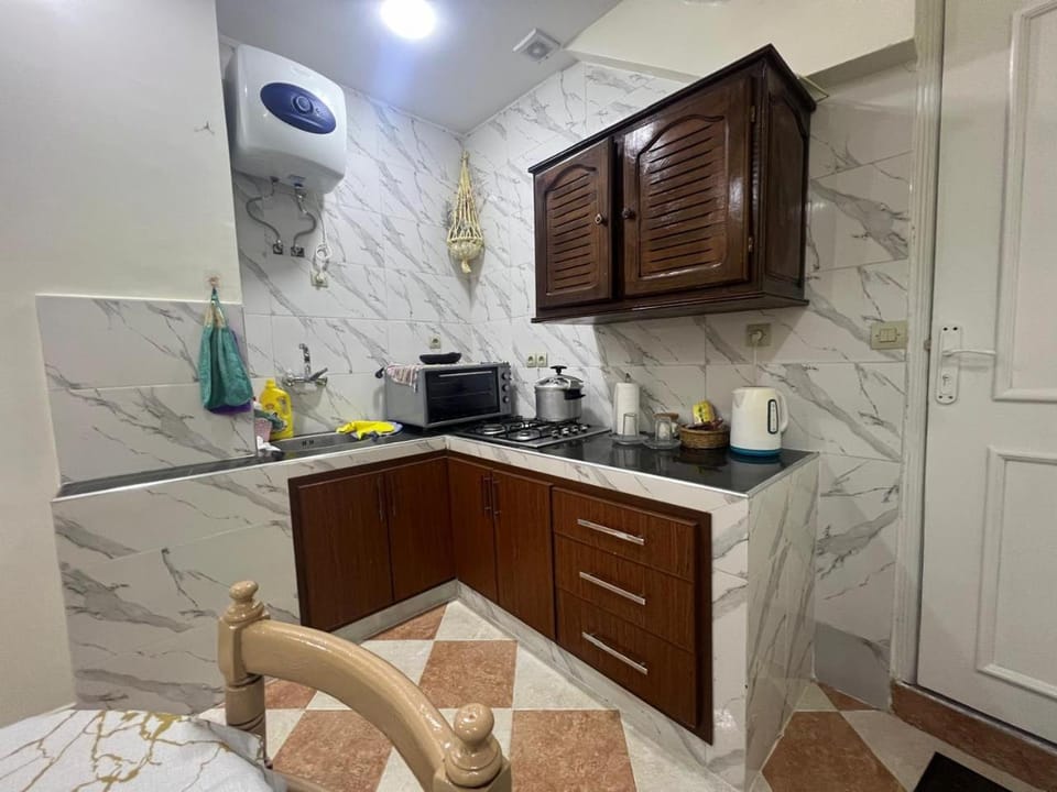 Kitchen or kitchenette, stove, kitchen