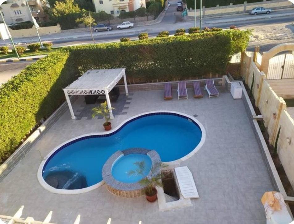 One bedroom flat with large terrace in a villa with swimming pool Apartment in Hurghada