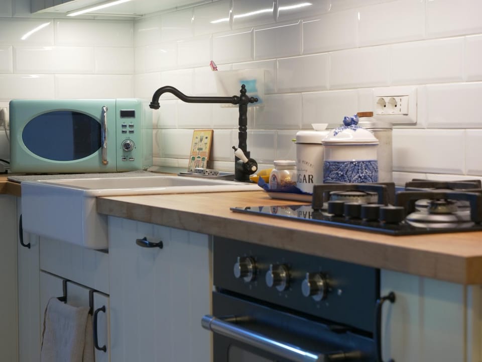 Kitchen or kitchenette, stove