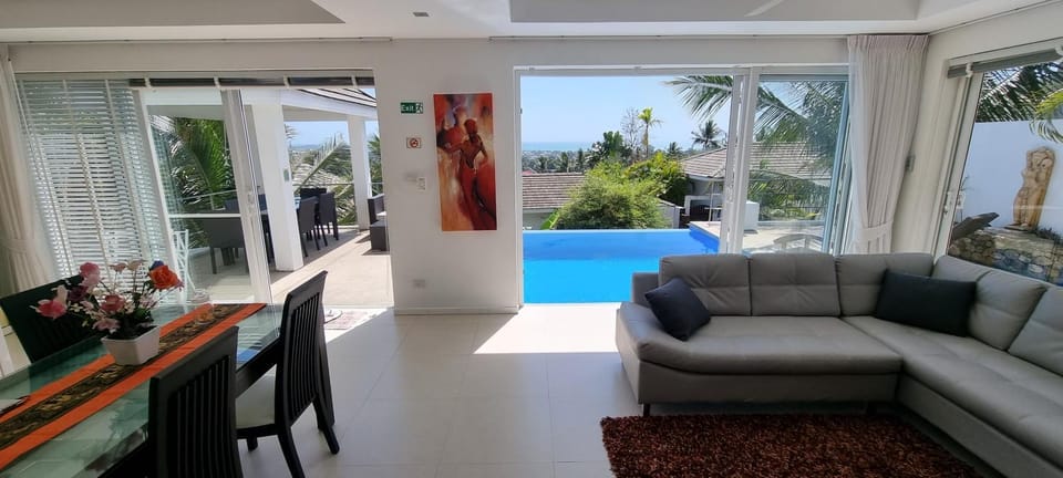 Balcony/Terrace, Living room, Seating area, Pool view, Sea view, Sea view