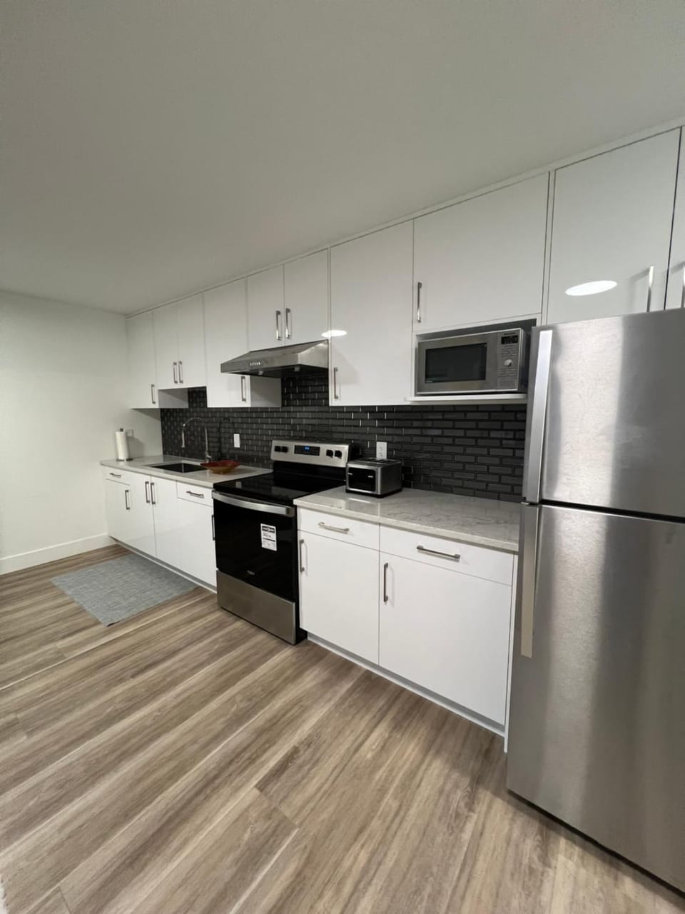 Kitchen or kitchenette, oven, stove