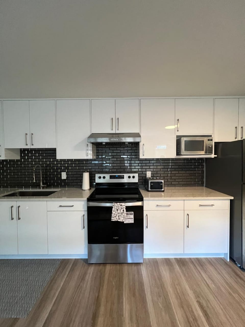 Kitchen or kitchenette, stove, toaster