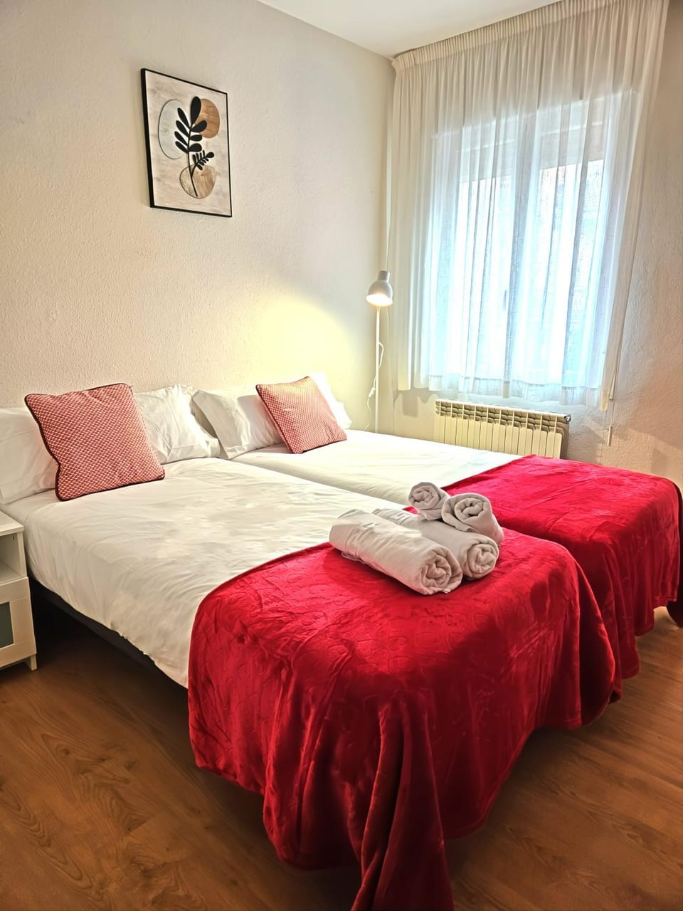 Bed, towels, wardrobe