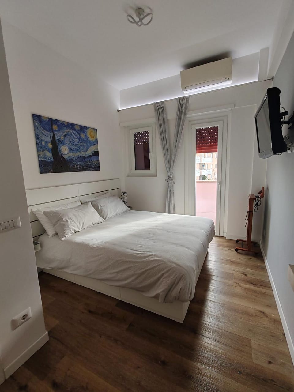 Bed, Balcony/Terrace, trouser press, wardrobe, air conditioner
