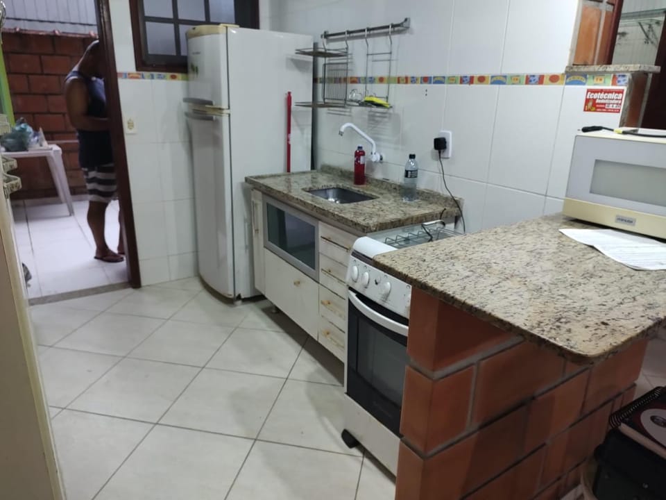 Kitchen or kitchenette, oven, stove