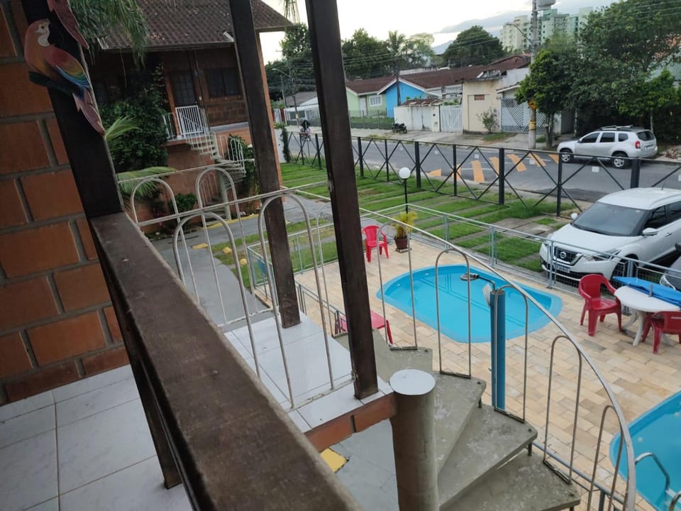 Property building, Day, Pool view, Street view, Swimming pool, Parking