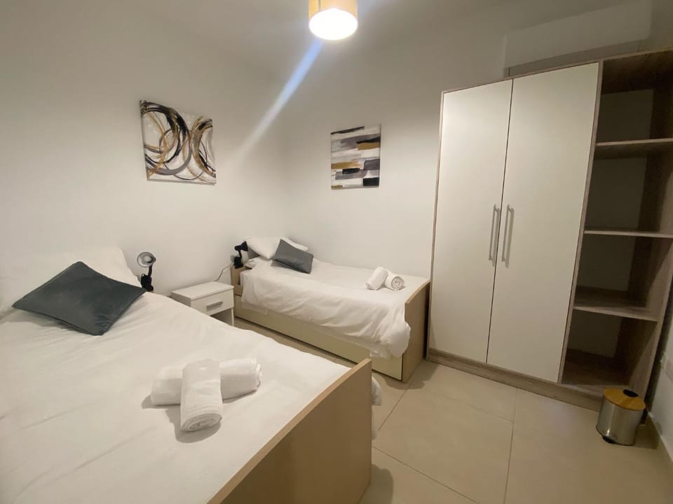 Bed, Photo of the whole room, Bedroom, towels, wardrobe