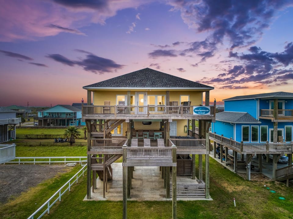 Waves & Whiskey Beachfront HotTub Double Decks! Tiki Bar House in Bolivar Peninsula