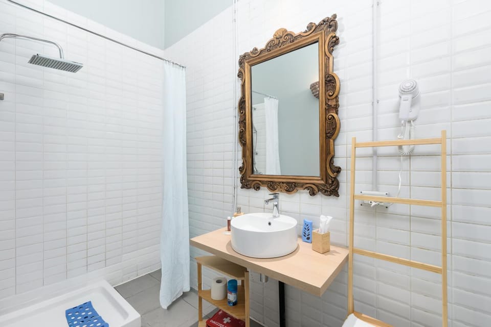 Shower, Toilet, Bathroom, hair dryier, towels