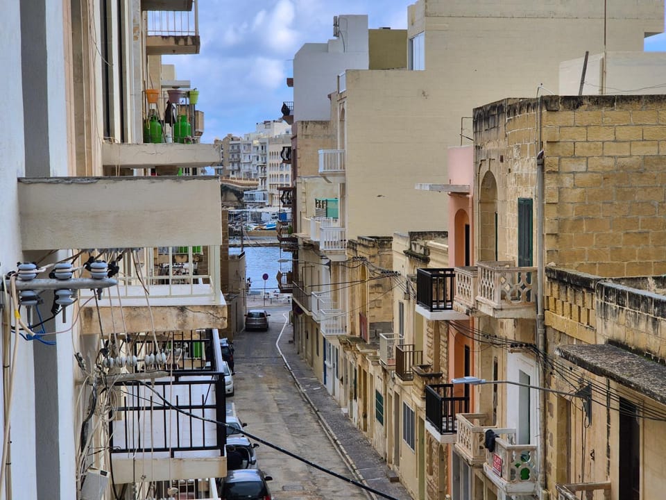 Property building, Patio, Day, View (from property/room), Balcony/Terrace, City view