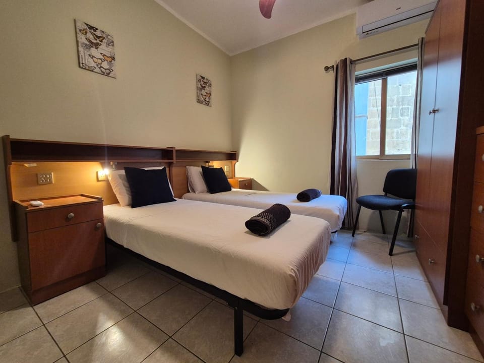 Bed, Photo of the whole room, Bedroom, towels, air conditioner