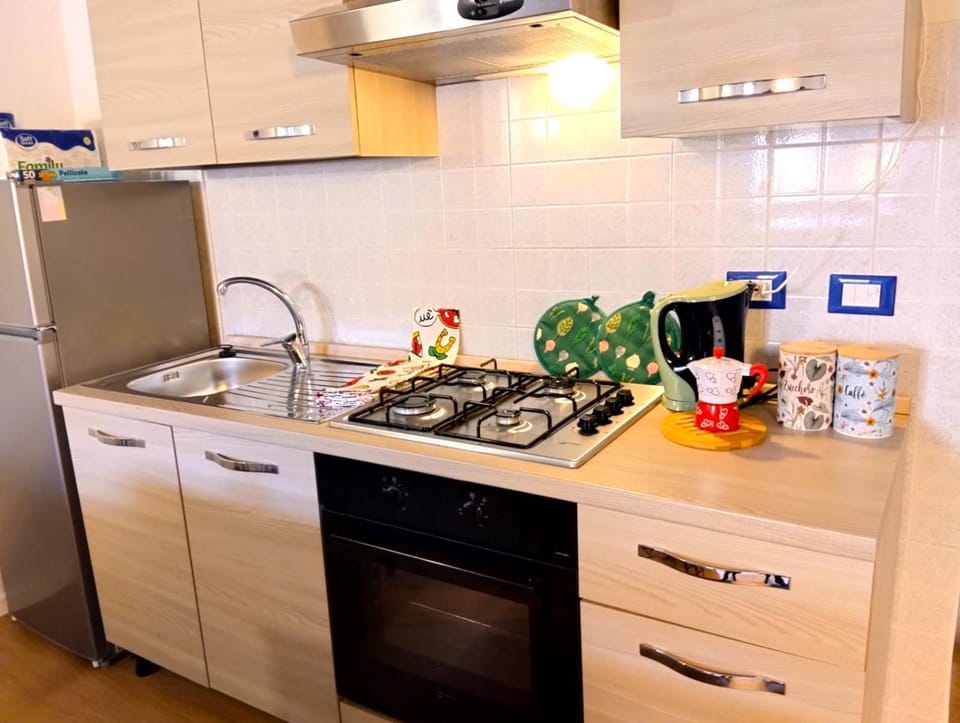 Kitchen or kitchenette, stove