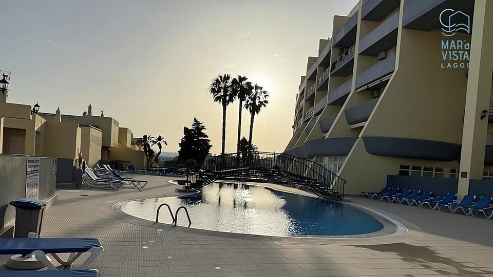 Property building, Swimming pool, sunbed