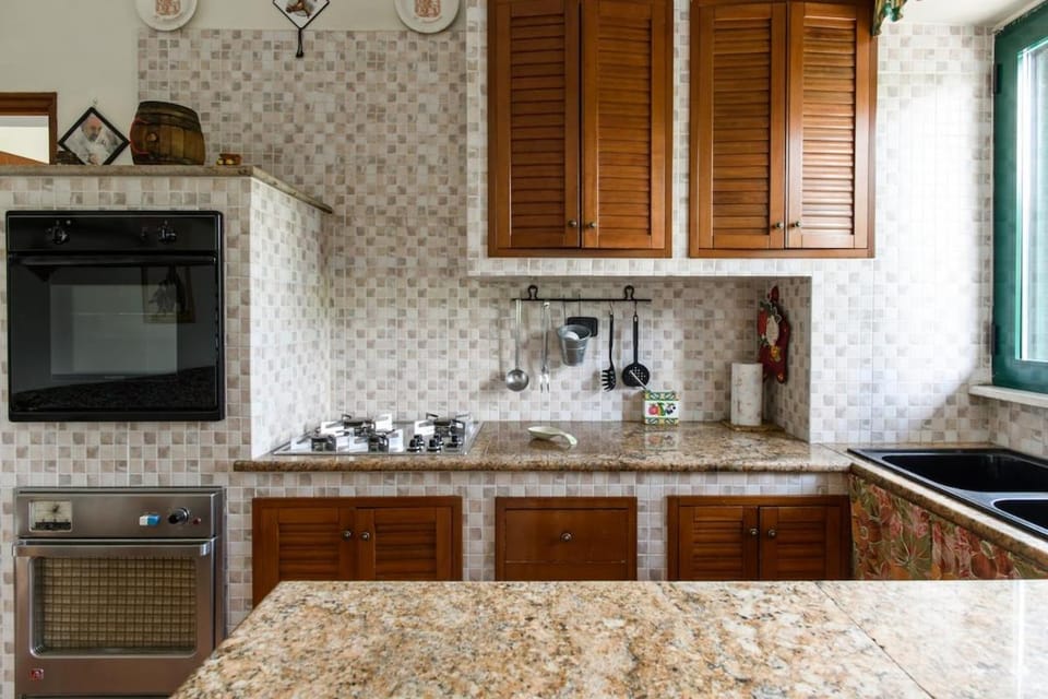 Kitchen or kitchenette, oven, stove