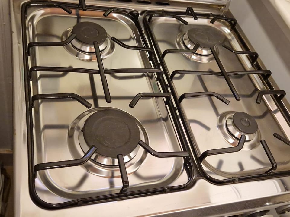 Kitchen or kitchenette, stove