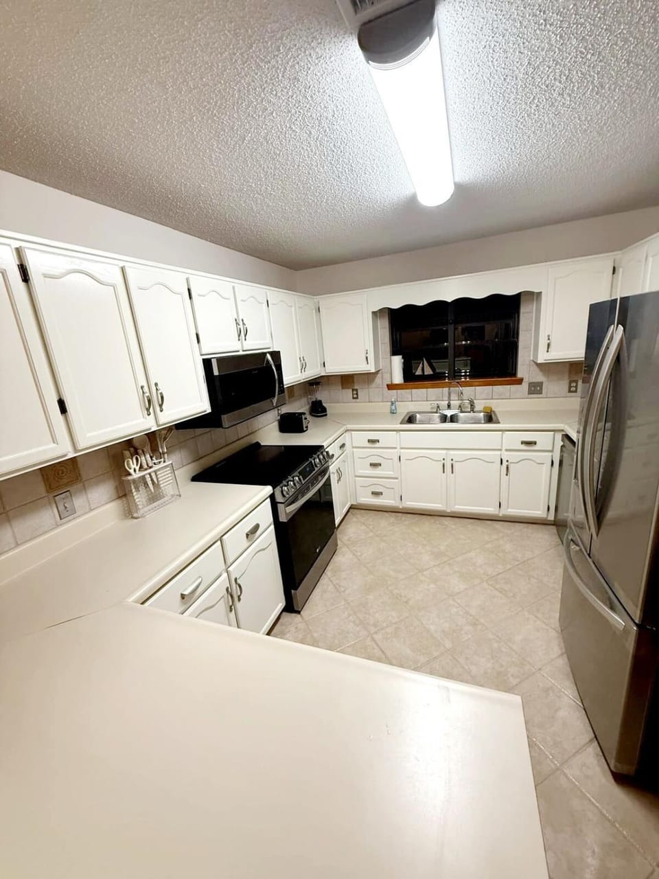 Spacious 3BR Family Beach Home 5 Mins to Panama City Beach & Sleeps 9 Hot tub House in Lower Grand Lagoon