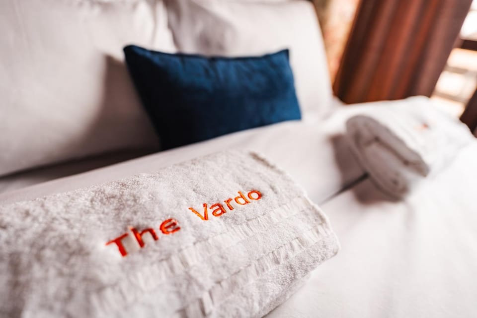 Bed, Bedroom, Text overlay, towels