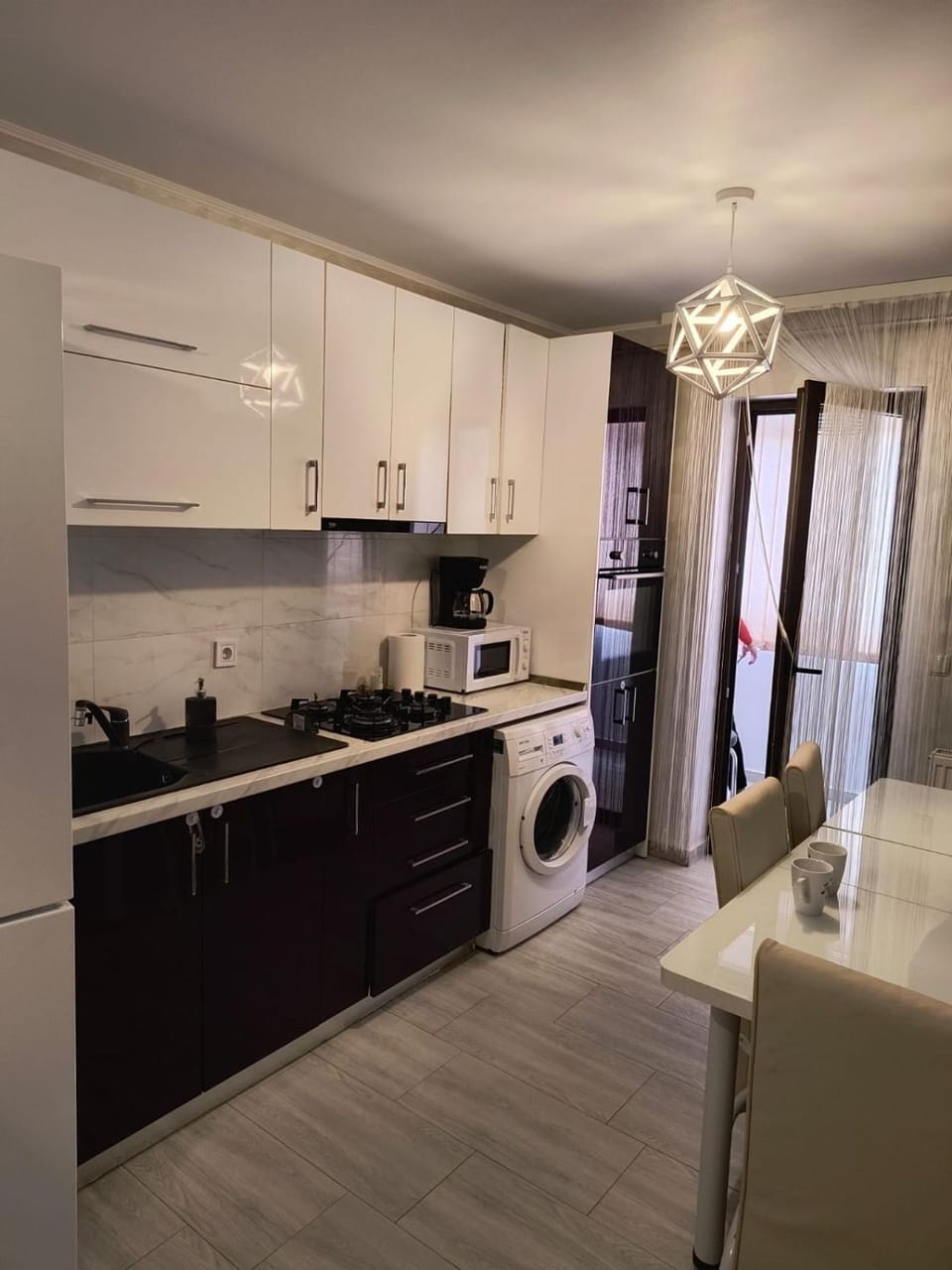 Kitchen or kitchenette, Seating area, Dining area, oven, stove, washing machine