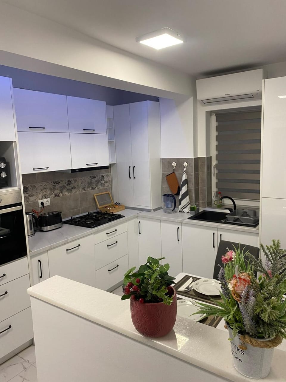 Kitchen or kitchenette, stove
