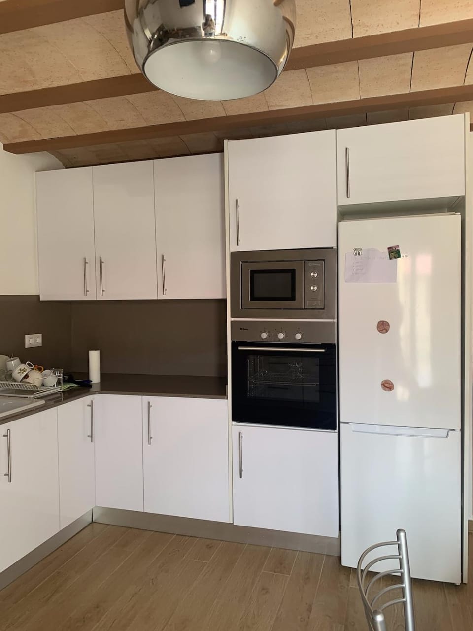 Kitchen or kitchenette, dishwasher, oven