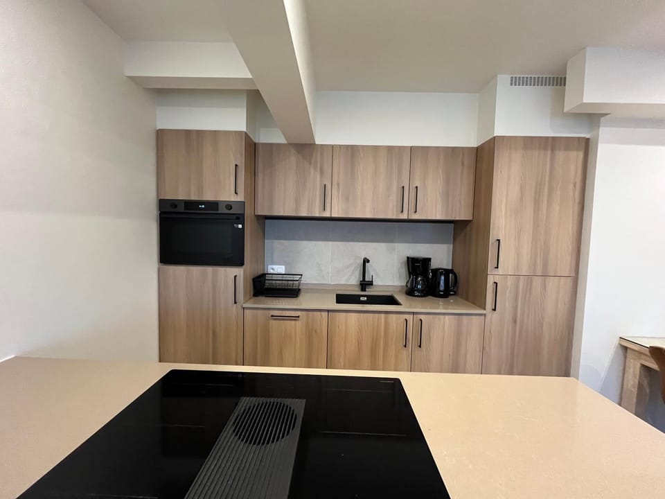 Kitchen or kitchenette, oven, stove