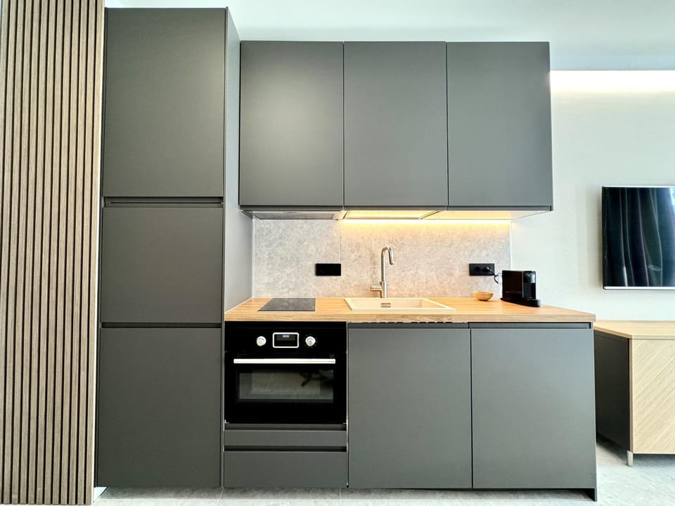 microwave, oven, stove, laundry, kitchen