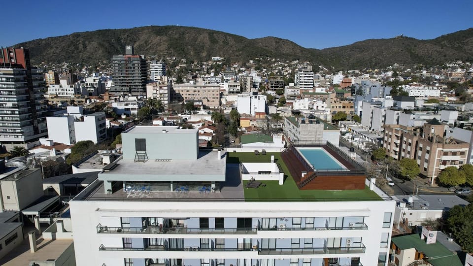 Property building, Nearby landmark, Day, Neighbourhood, Natural landscape, Bird's eye view, City view, Mountain view