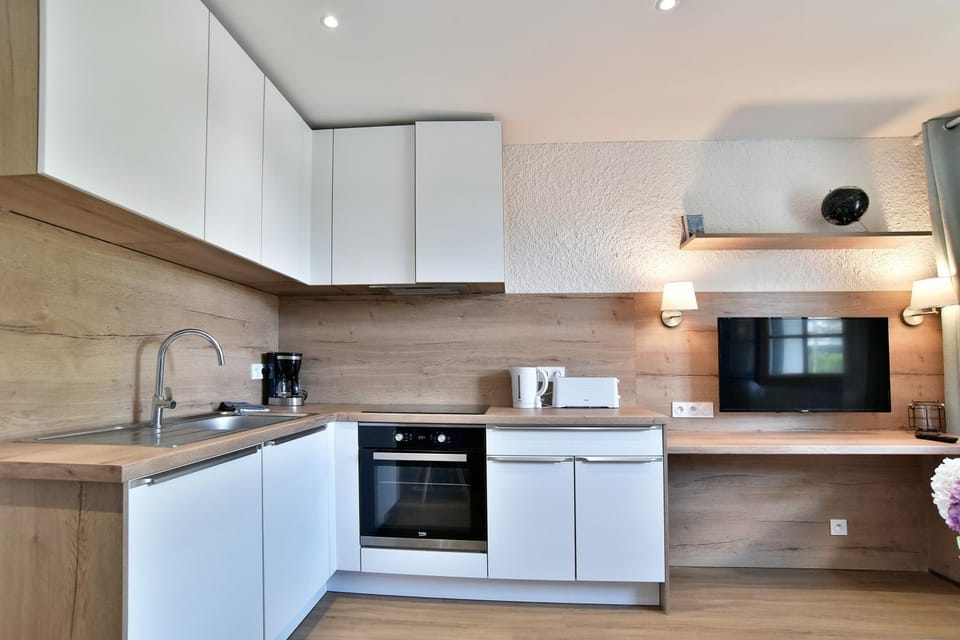 Kitchen or kitchenette, stove