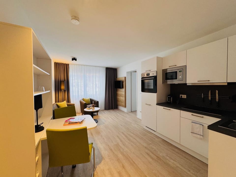 Kitchen or kitchenette, Living room, Dining area, dishwasher, oven, stove