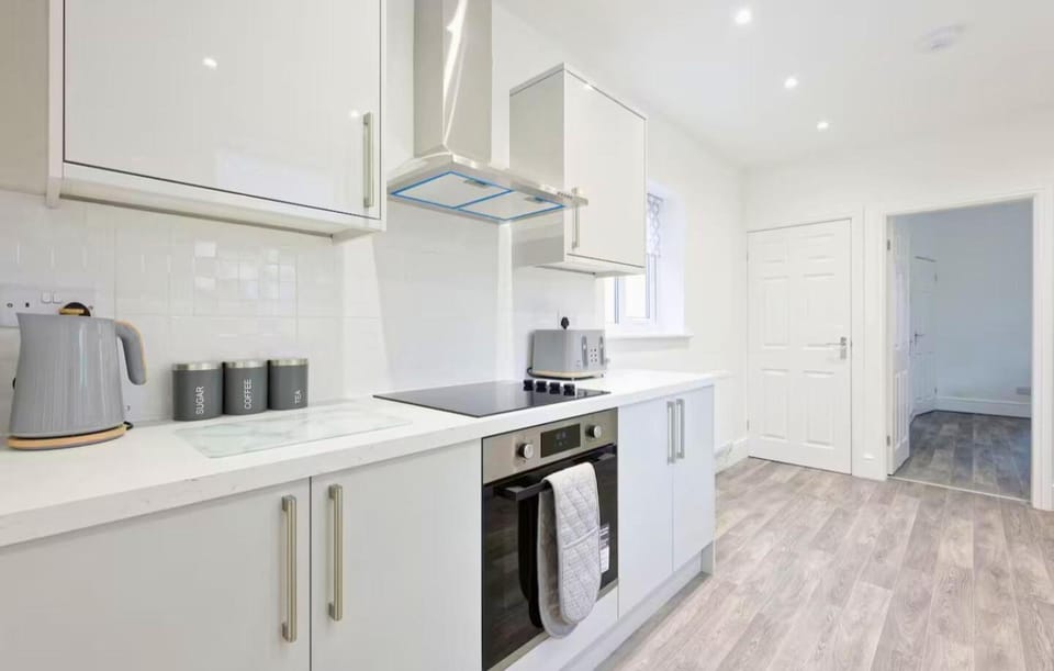 Kitchen or kitchenette, oven, stove