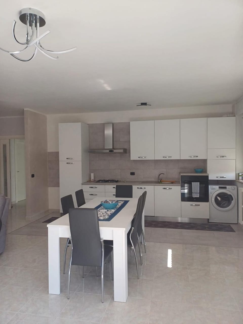 Kitchen or kitchenette, Dining area, dishwasher, oven, stove, washing machine