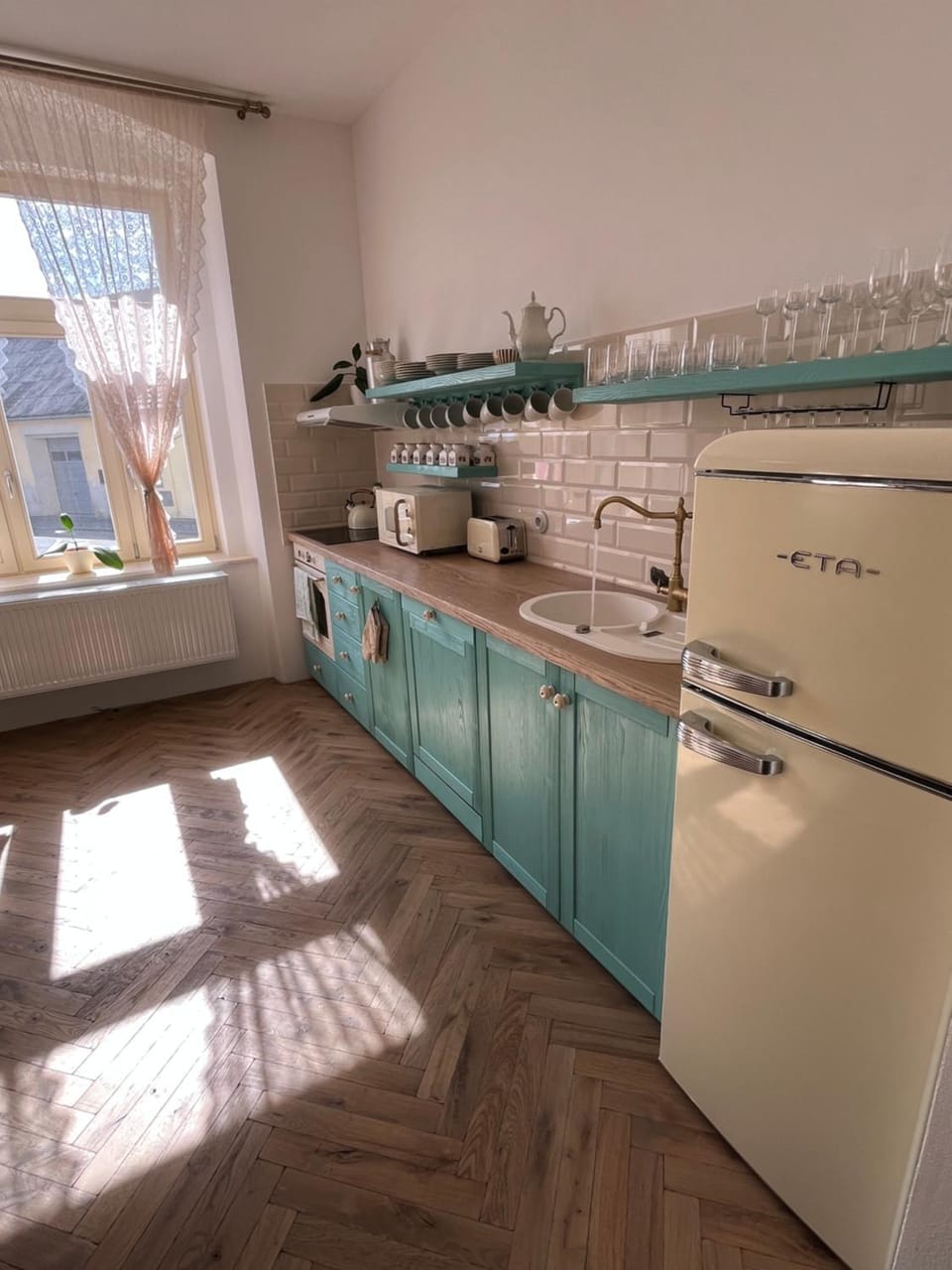 Kitchen or kitchenette, dishwasher, oven, stove
