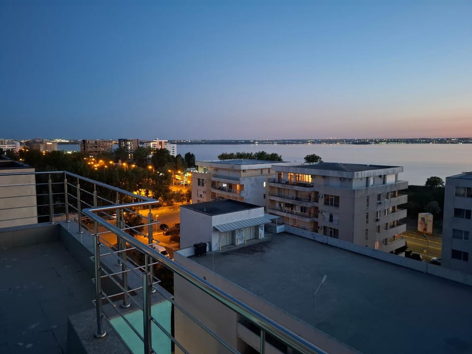 Neighbourhood, Natural landscape, Bird's eye view, Nightclub / DJ, View (from property/room), Balcony/Terrace, Lake view, Sea view, Sunset
