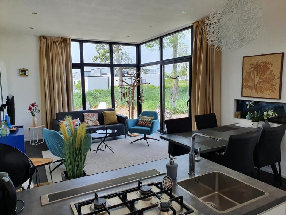 Breskens Chalet Herzklopfen Breskens mit Zaun Hausnr B092 House in Zeeland, Netherlands