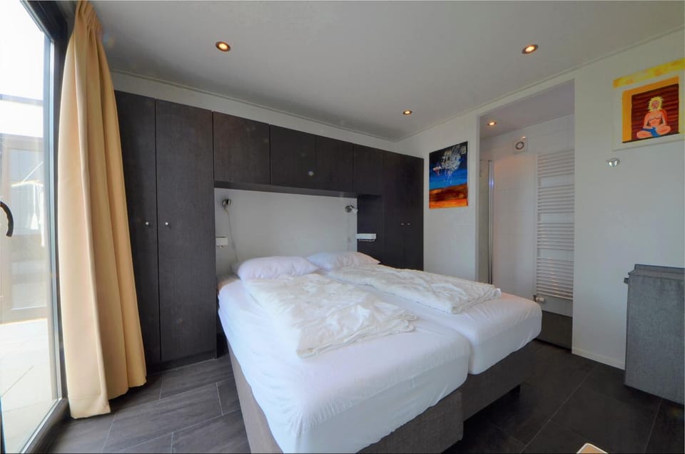 Breskens Chalet Herzklopfen Breskens mit Zaun Hausnr B092 House in Zeeland, Netherlands