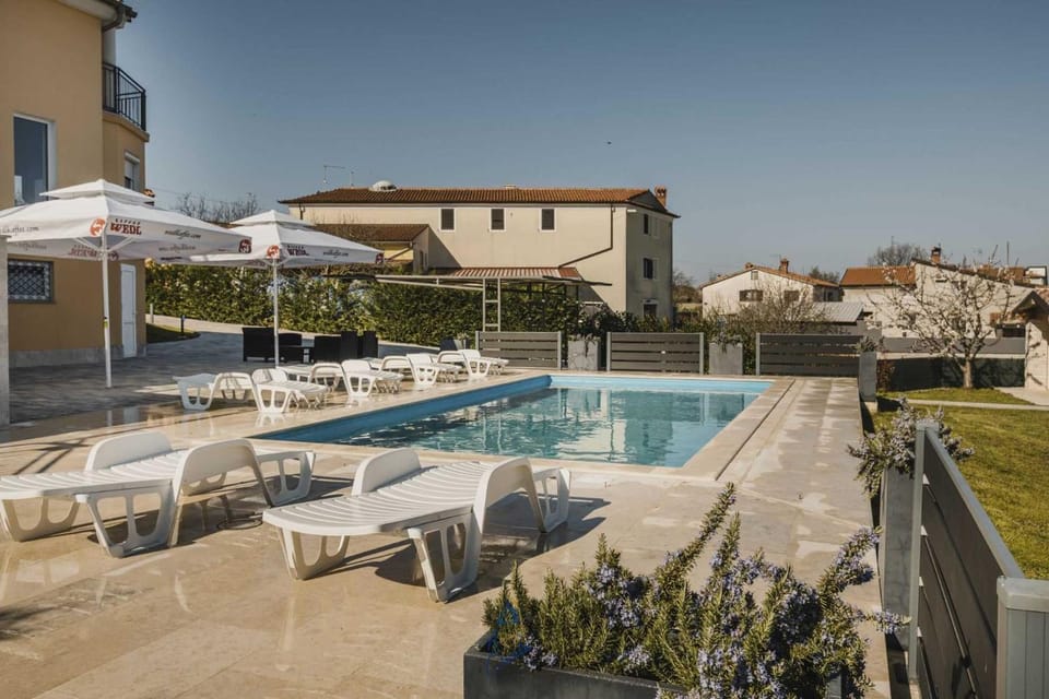 Property building, Patio, Day, Garden view, Pool view, Swimming pool, sunbed