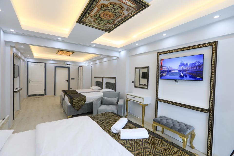 Bed, TV and multimedia, Seating area, Bedroom, air conditioner