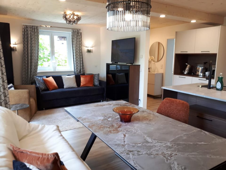 Kitchen or kitchenette, Living room, Seating area, Dining area